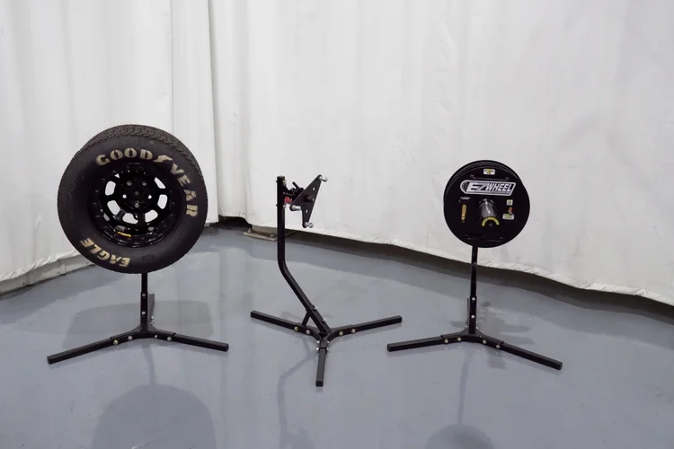 Racing wheels on manual tire prep stands